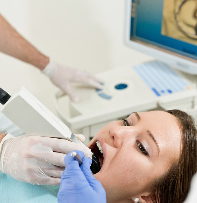 Patient receiving digital scans of their smile