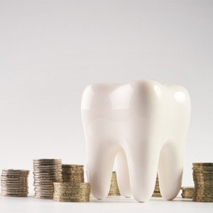 Coins used to pay the cost of cosmetic dentistry in Lansing