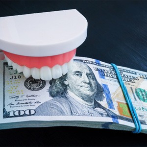 Money saved after paying the cost of cosmetic dentistry in Lansing 