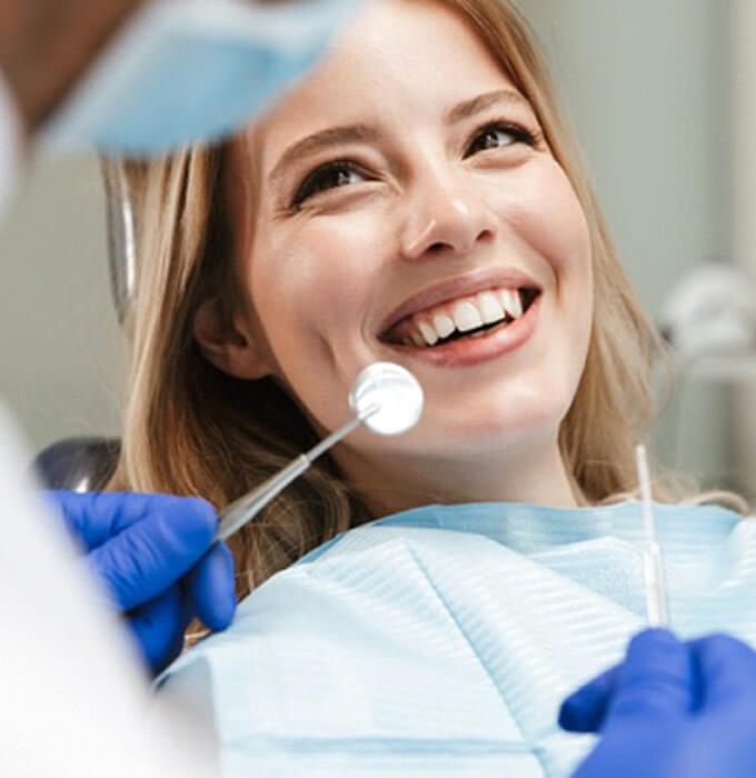 Patient smiles at dentist