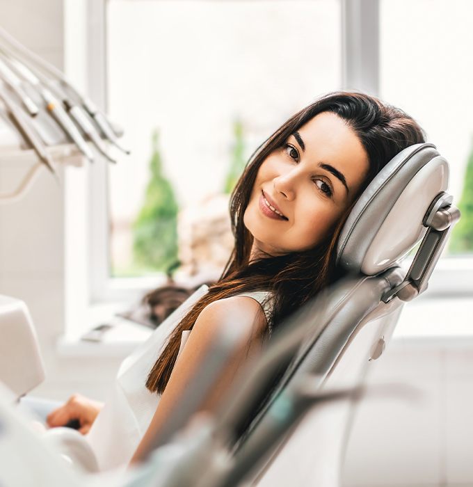 Woman visiting dentist for preventive dentistry checkup