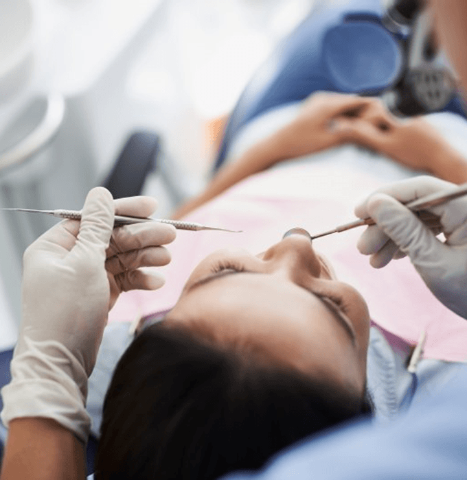 a patient in Lansing getting tooth-colored fillings