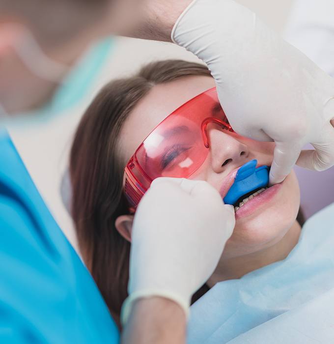 Patient receiving fluoride treatment