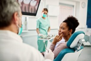 Woman at her emergency dentist with sudden dental discomfort